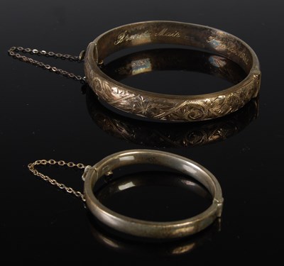 Lot 48 - A Birmingham silver hinged bangle with foliate...