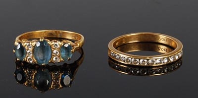 Lot 57 - An 18ct gold gem set ring, size Q; together...