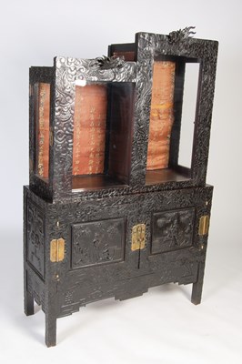 Lot 98 - A Chinese dark wood display cabinet, late...