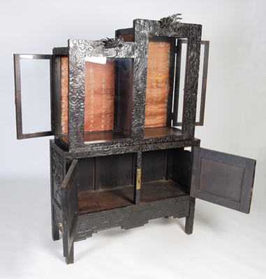 Lot 98 - A Chinese dark wood display cabinet, late...