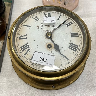 Lot 343 - A brass cased ships bulkhead clock, 17cm...