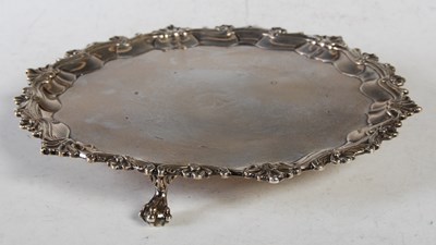 Lot 88 - A George III silver salver, London 1772,...