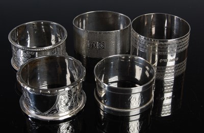 Lot 99 - Five assorted silver napkin rings, gross...