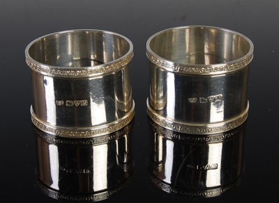 Lot 111 - A cased pair of Chester silver napkin rings.