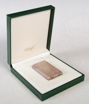 Lot 115 - A boxed Davidoff white metal gas lighter.