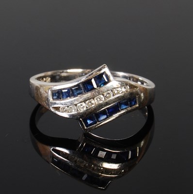 Lot 150 - A white metal and gem set ring, stamped '9k',...