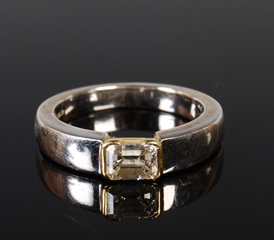 Lot 155 - An 18ct white and yellow gold single stone...