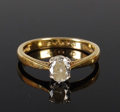 Lot 156 - An 18ct gold and diamond single stone ring,...