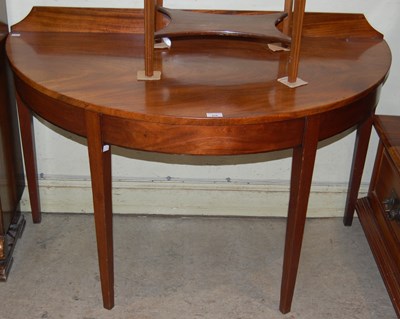 Lot 618 - A mahogany demilune console table with raised...