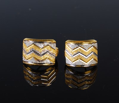 Lot 169 - A pair of yellow and white metal earrings,...