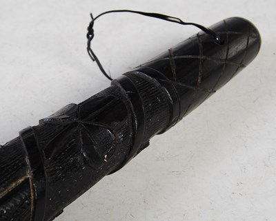 Lot 188 - An Irish bog oak truncheon/priest, 31cm long.