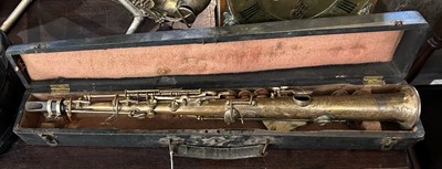 Lot 402 - A vintage Elkhart Soprano saxophone in case.