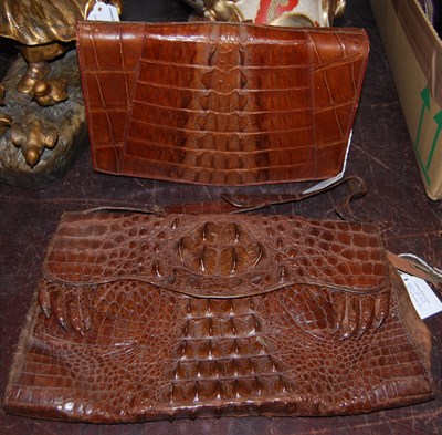 Lot 407 - Two vintage crocodile skin handbags, 34cm wide...