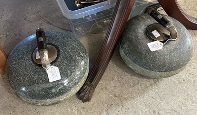 Lot 450B - A pair of curling stones.