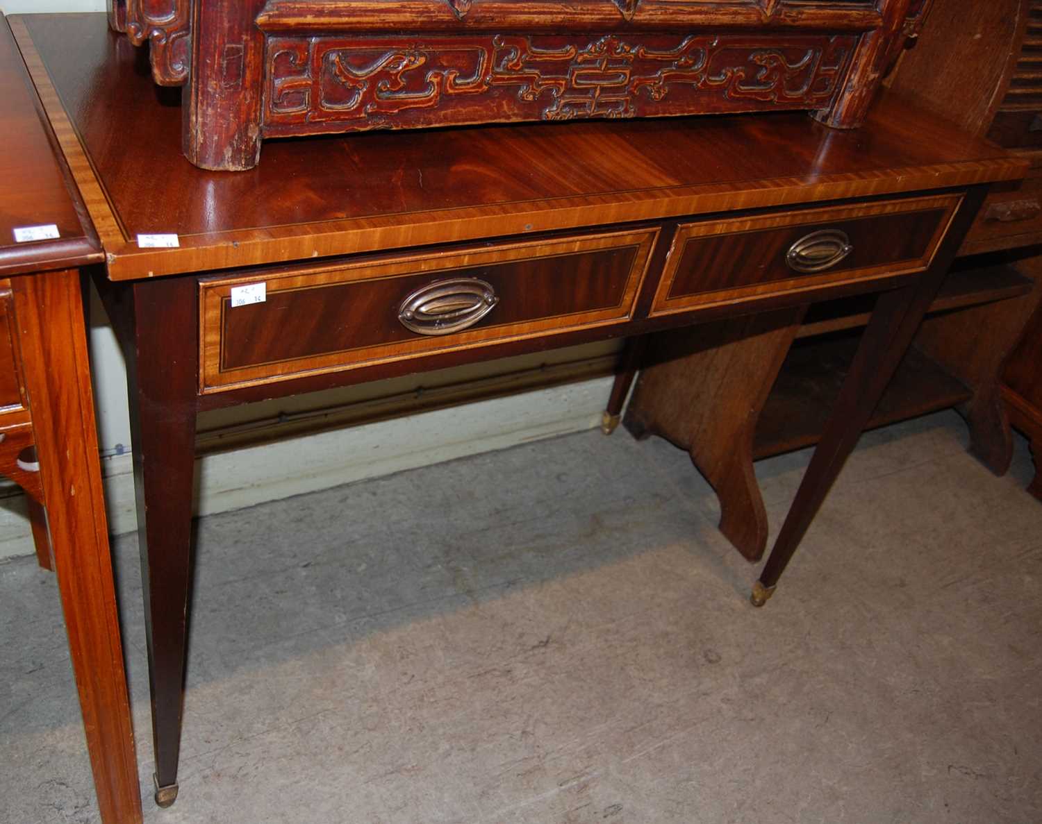 Lot 624 A reproduction side table with three