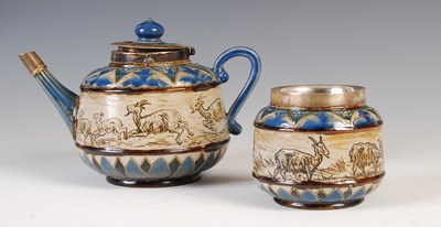 Lot 240 - A Doulton Lambeth silver mounted stoneware tea...