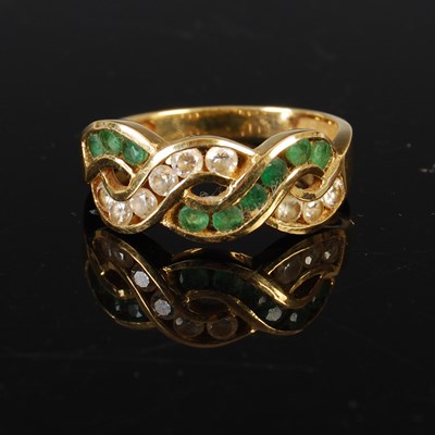 Lot 228 - A yellow metal, emerald and diamond chip...