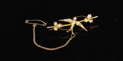 Lot 223 - A yellow metal and split pearl swallow brooch,...