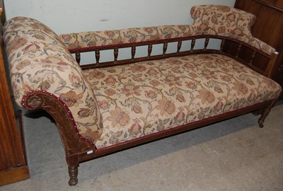 Lot 630 - A 19th century dark wood chaise longue with...