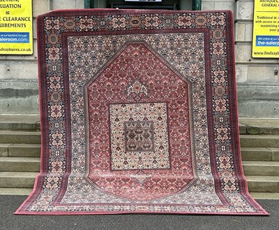 Lot 768 - A machine made Royal Keshan carpet,...