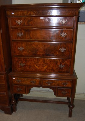 Lot 632 - A 20th century walnut chest on stand, the...