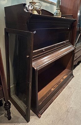 Lot 573 - A vintage two sectional oak Lebus bookcase,...