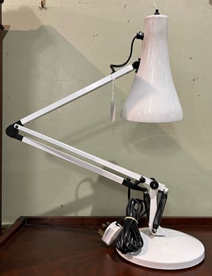 Lot 577 - A 20th century white coloured angle poise lamp.