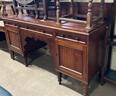 Lot 584 - A 19th century mahogany sideboard, fitted with...