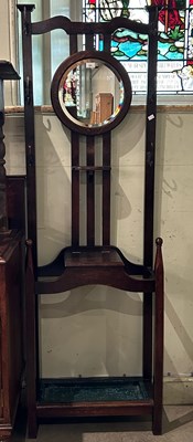 Lot 585 - An early 20th century stained oak hallstand,...