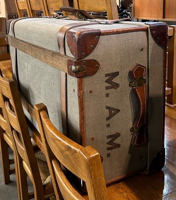 Lot 599 - A vintage canvas and leather cabin trunk by...