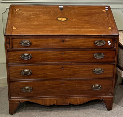 Lot 610 - A George III mahogany and boxwood lined bureau,...