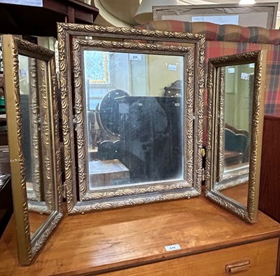 Lot 615 - A gilt framed triple plate dressing table...