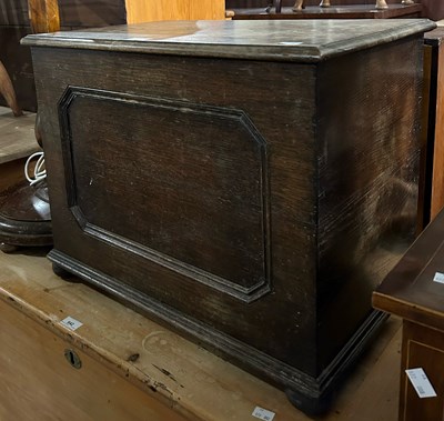 Lot 643 - An early 20th century oak storage box, with...