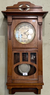 Lot 663 - An early 20th century mahogany wall clock with...