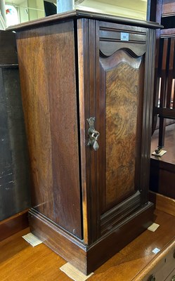 Lot 665 - A Victorian walnut pot cupboard, and an...