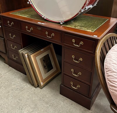 Lot 675 - A reproduction mahogany pedestal desk with...