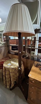 Lot 704 - A mahogany standard lamp and shade; together...