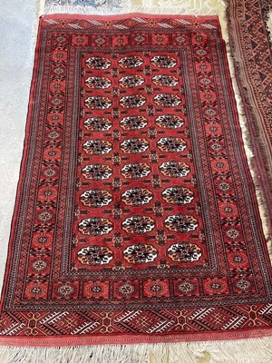 Lot 775 - A Tekke type rug, the madder ground decorated...