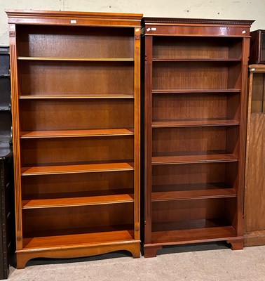 Lot 727 - Two modern open bookcases, both fitted with...