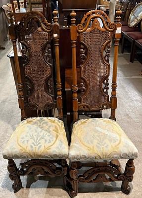 Lot 728 - A pair of walnut hall chairs with canework...