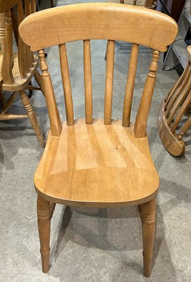 Lot 759 - A set of eight pine kitchen chairs comprising...