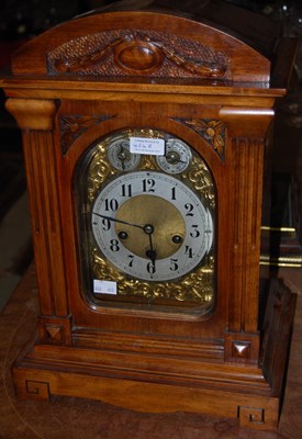 Lot 424A - An early 20th century walnut cased mantle...