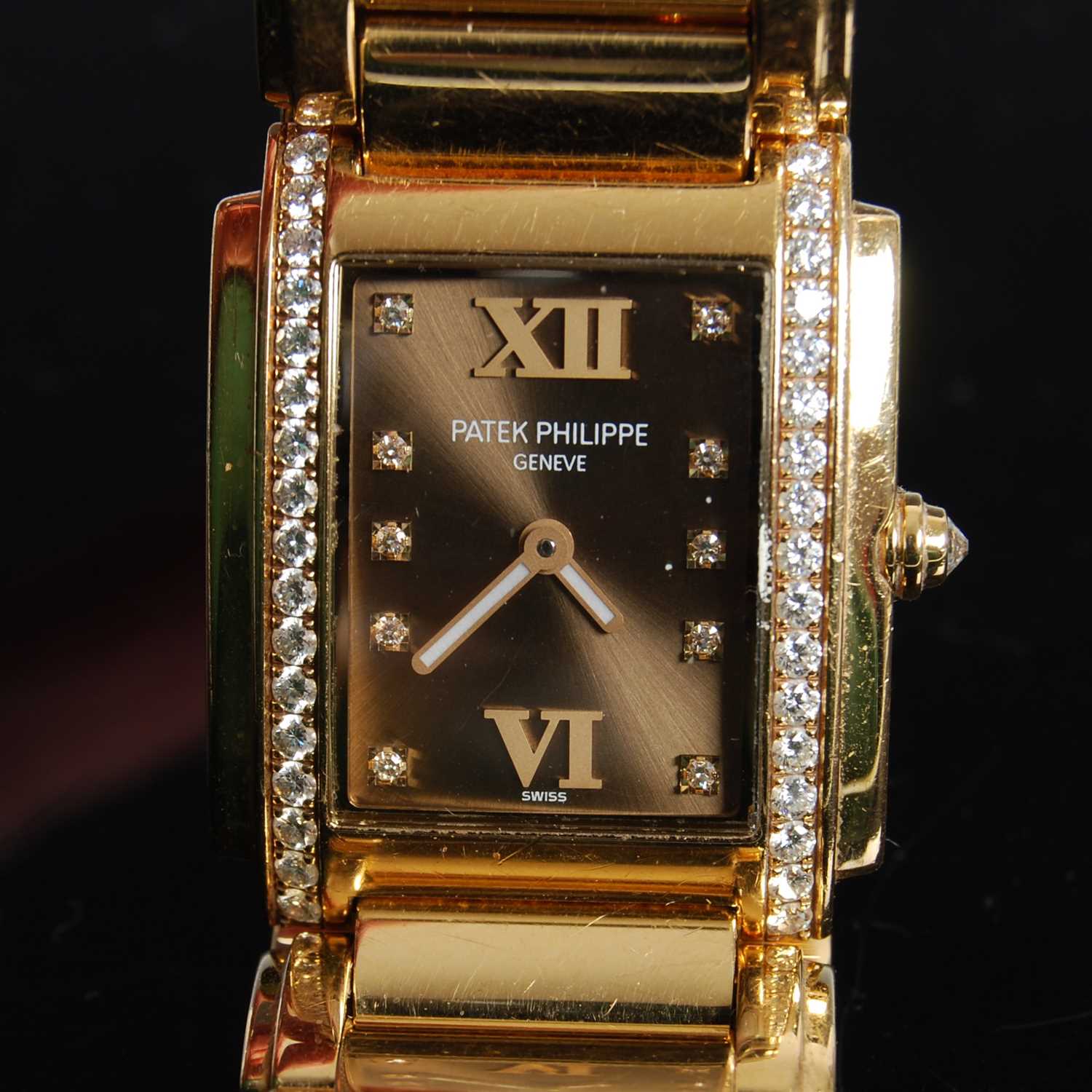 Lot 638 - A ladies 18ct gold and diamond set Patek...