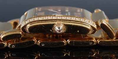 Lot 638 - A ladies 18ct gold and diamond set Patek...