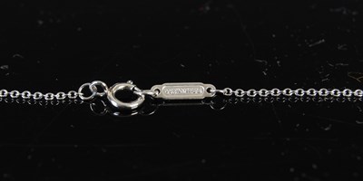 Lot 745 - Tiffany & Co., a platinum and diamond Paper...