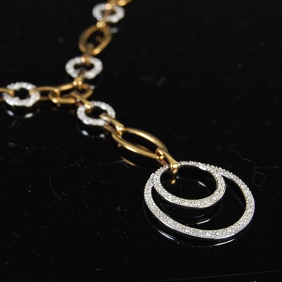 Lot 731 - A 9ct yellow and white gold diamond pendant...