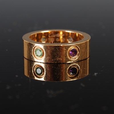 Lot 723 - Cartier, an 18ct gold and coloured gemstone...