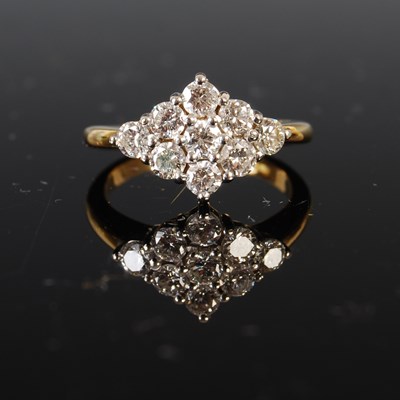 Lot 741 - An 18ct yellow and white gold diamond navette...