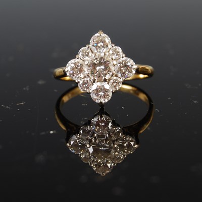 Lot 740 - An 18ct gold, lozenge shaped diamond cluster...