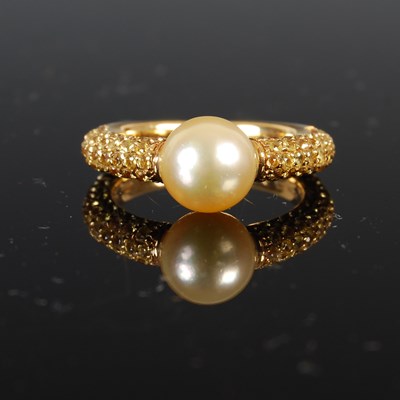 Lot 713 - An 18ct gold, single stone cultured pearl, and...